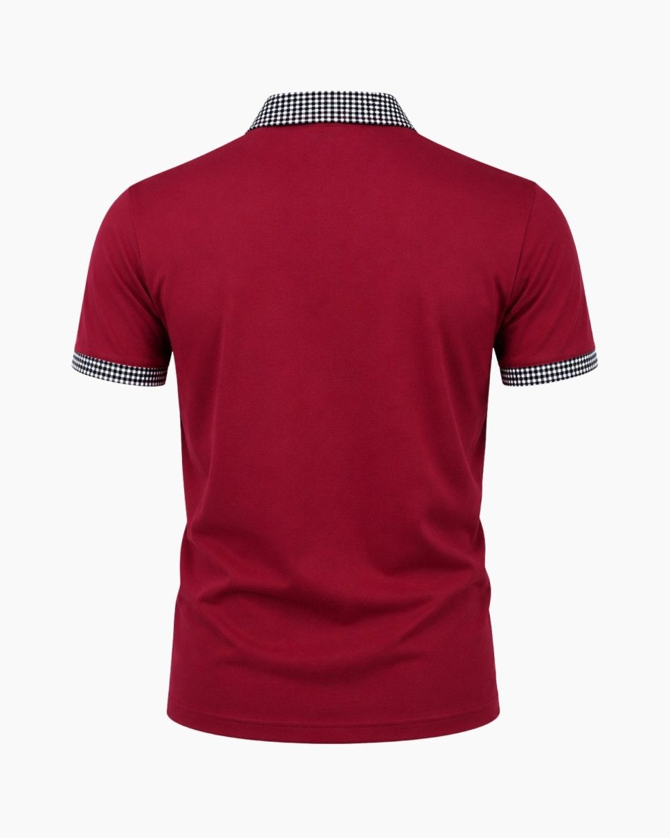 Red polo shirt with checkered collar and sleeve trim on a white background