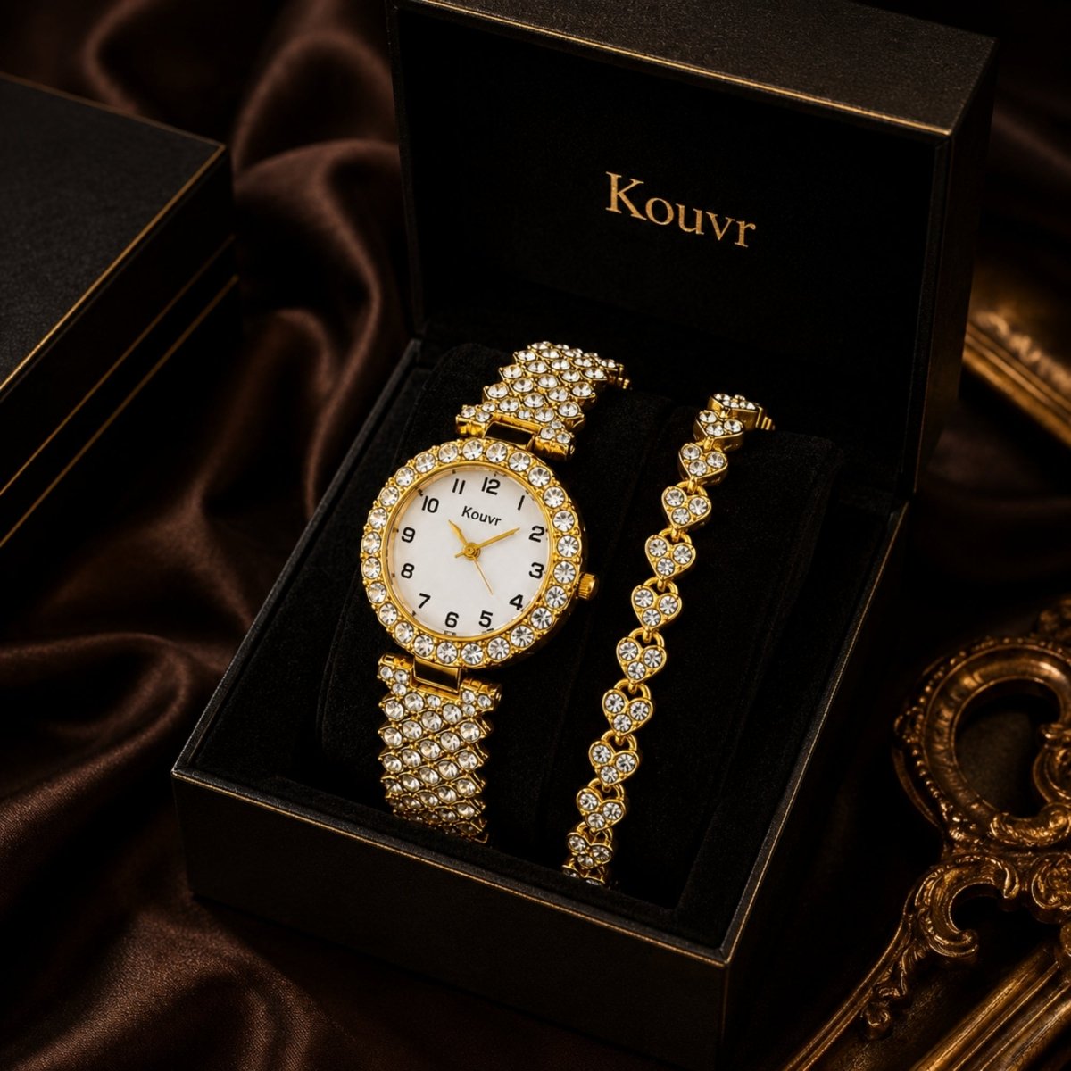 Top down view of the Kouvr women's luxury gold watch with crystal halo and matching iced out heart bracelet
