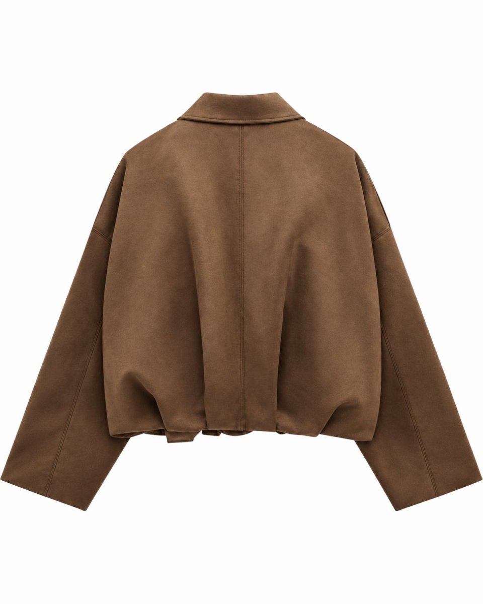 A cropped green suede jacket with long sleeves and a wide collar, shown from the back on a solid white background.