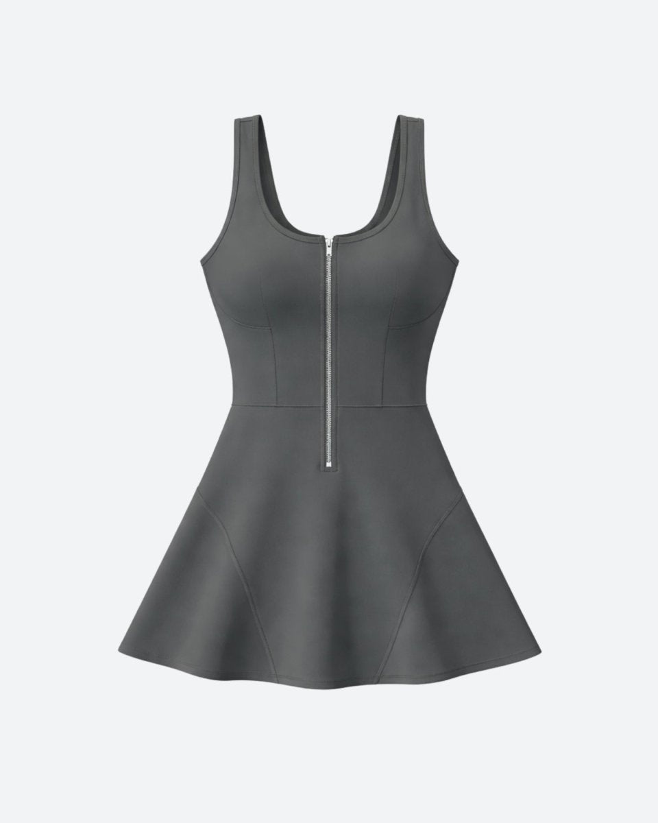 Studio product shot of a grey sleeveless athletic skater dress with silver front zipper