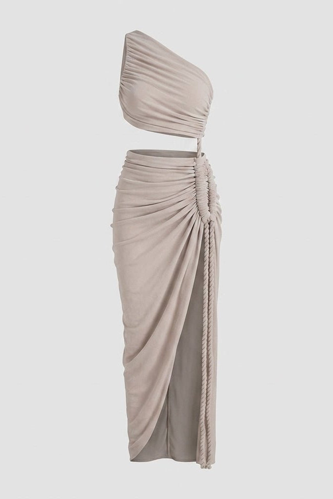 Grey asymmetrical one shoulder cutout maxi dress floating against a light grey background.