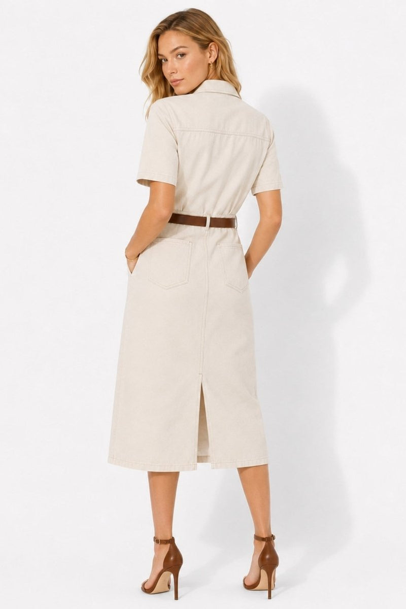Back view of ivory tailored safari style midi dress showing back patch pockets and center back slit.