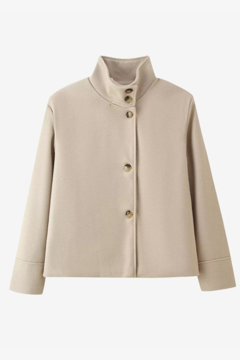 A light beige cropped jacket with a high stand-up collar and three decorative buttons down the front, displayed on a clean white background.
