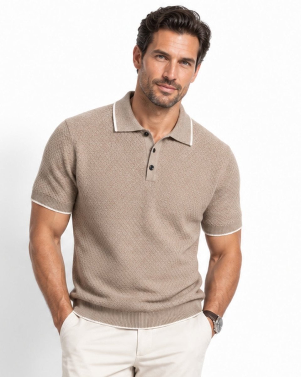 Handsome man wearing a Khaki men's luxury textured knit polo shirt with white tipping, styled with beige chinos for an elegant smart casual look.