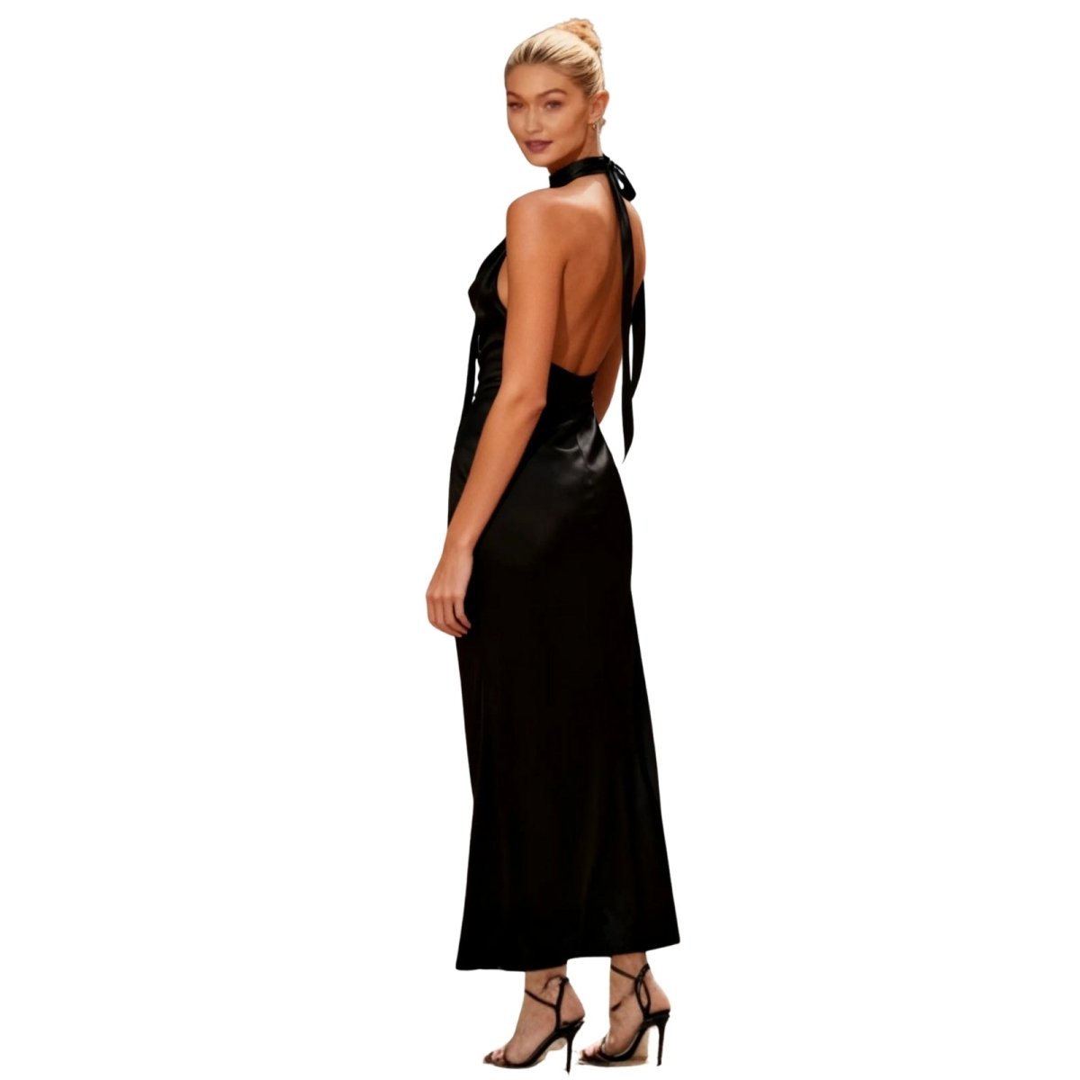 Woman wearing a black kouvr dress with a bow detail on a white background