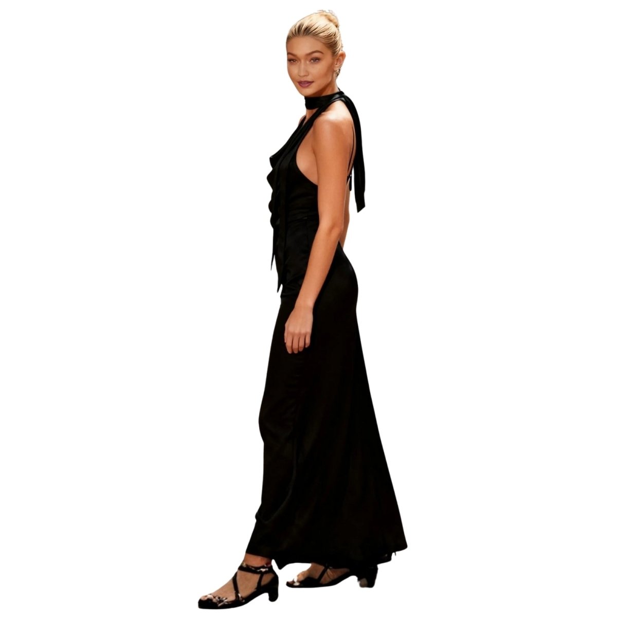 Woman wearing a black kouvr halter neck dress on a white background