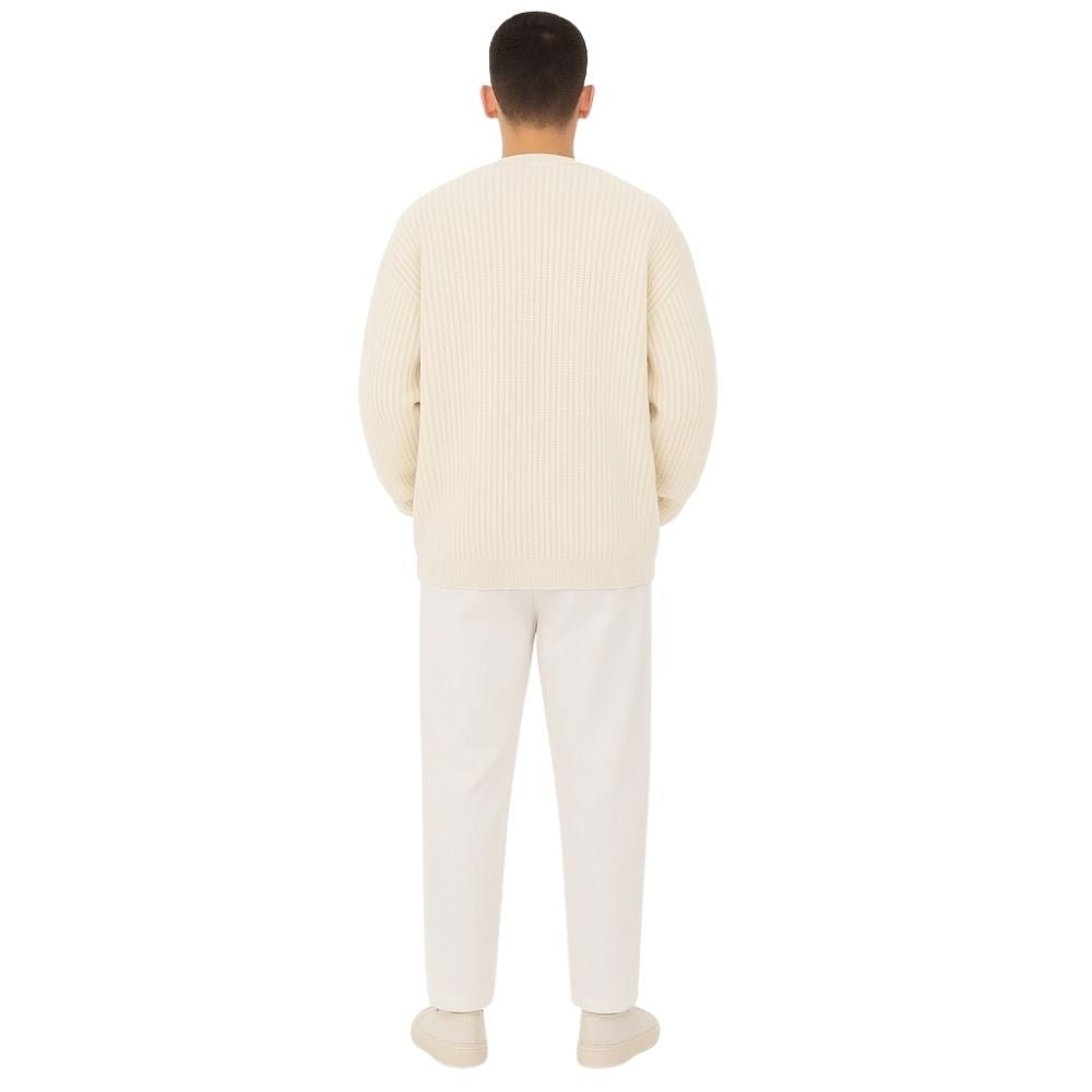 Minimalist zip up sweater, collarless knit outerwear, luxury oversized cardigan, quiet luxury jacket, off-white structured knit, contemporary men's knitwear