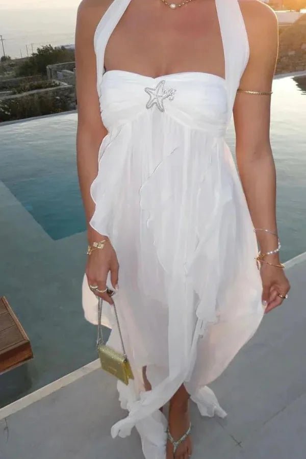 "ethereal," "goddess dress," "flowy," "resort wear," "Santorini style," "beach formal," and "honeymoon outfit