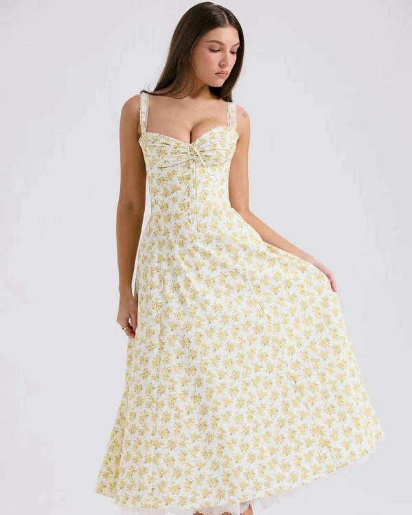 Kouvr's Aviva yellow floral vintage-inspired midi dress with sweetheart neckline and pockets