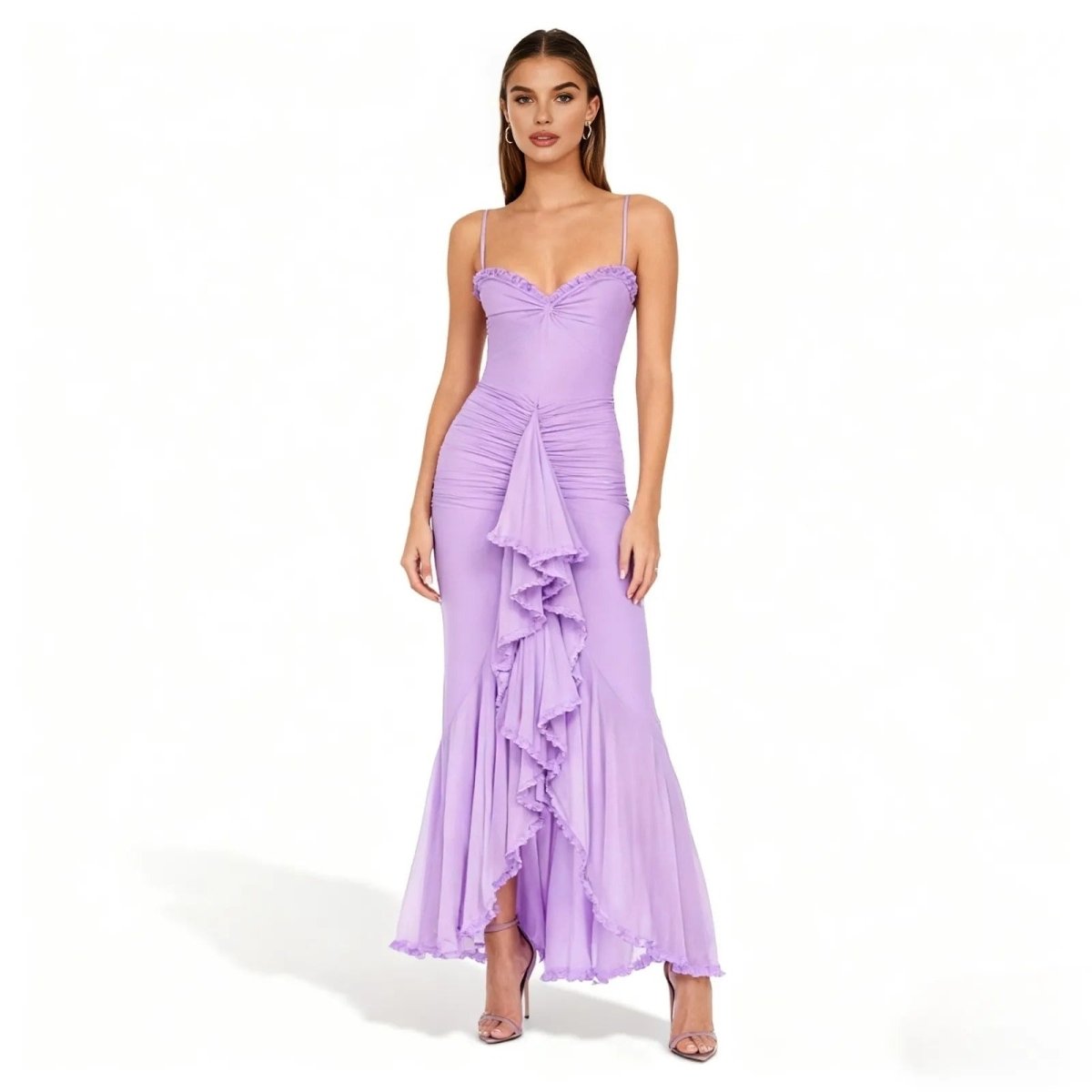 Woman wearing a lavender evening gown with ruffled details on a white background