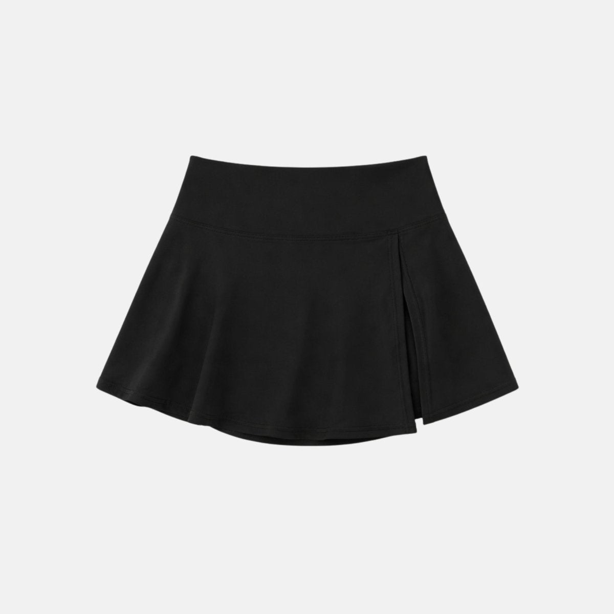 Isolated flatlay view of luxury black high-waisted activewear skort with side slit detail.