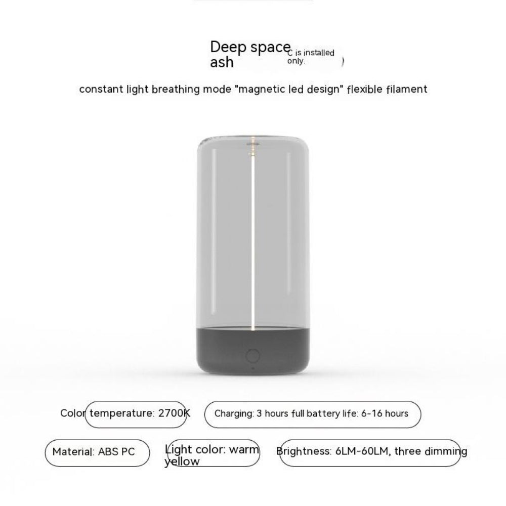 ambient lighting", "warm glow lamp", "minimalist home decor", "touch control light", "USB-C lamp", "portable centerpiece", "breathing light mode", "sculptural lighting", "hygge decor