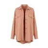 Flat lay product shot of the Kouvr Donna shacket in apricot, showing the waffle texture, chest pockets, and button front.