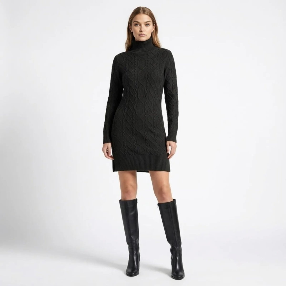 Model wearing the Kouvr Fashion black cable-knit turtleneck sweater dress with long sleeves, styled with black knee-high boots against a white background.