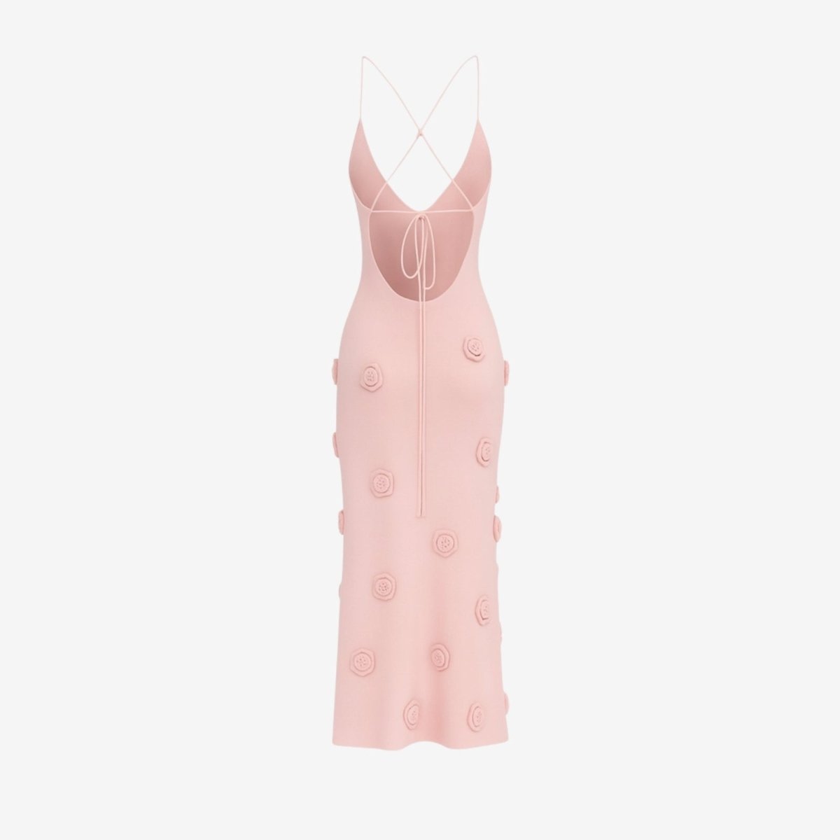 Pink kouvr slip dress with button details on a light gray background