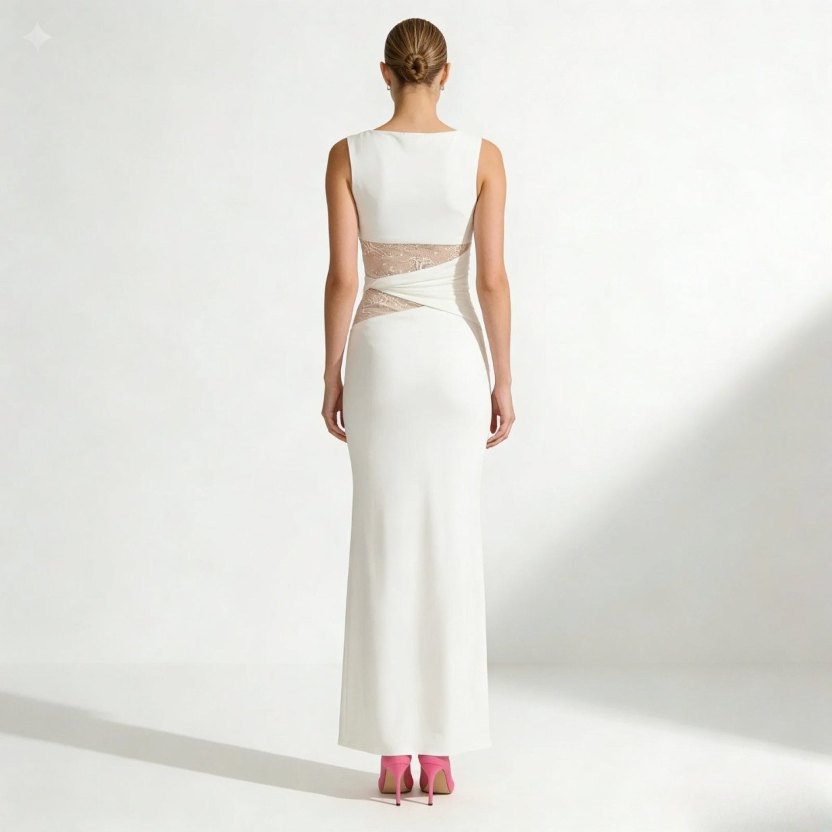 Back view of a model in the Kouvr Fashion Deborah oversized sweater, highlighting the drop shoulder and external seam details.