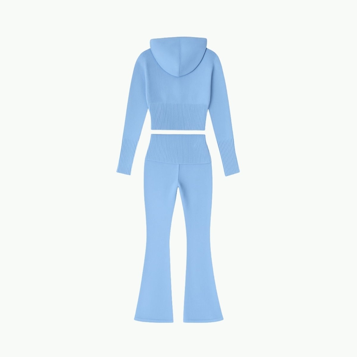 Flatlay product shot of the back of the Kouvr light blue knit hoodie and flared pants set on a white background.