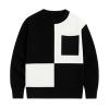 'monochrome,' 'intarsia knit,' 'geometric pattern,' 'heavyweight wool,' and 'statement piece
