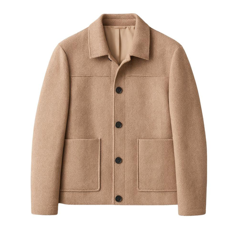 A man wearing the Kouvr Fashion khaki herringbone wool jacket over a white turtleneck, showcasing a smart casual look