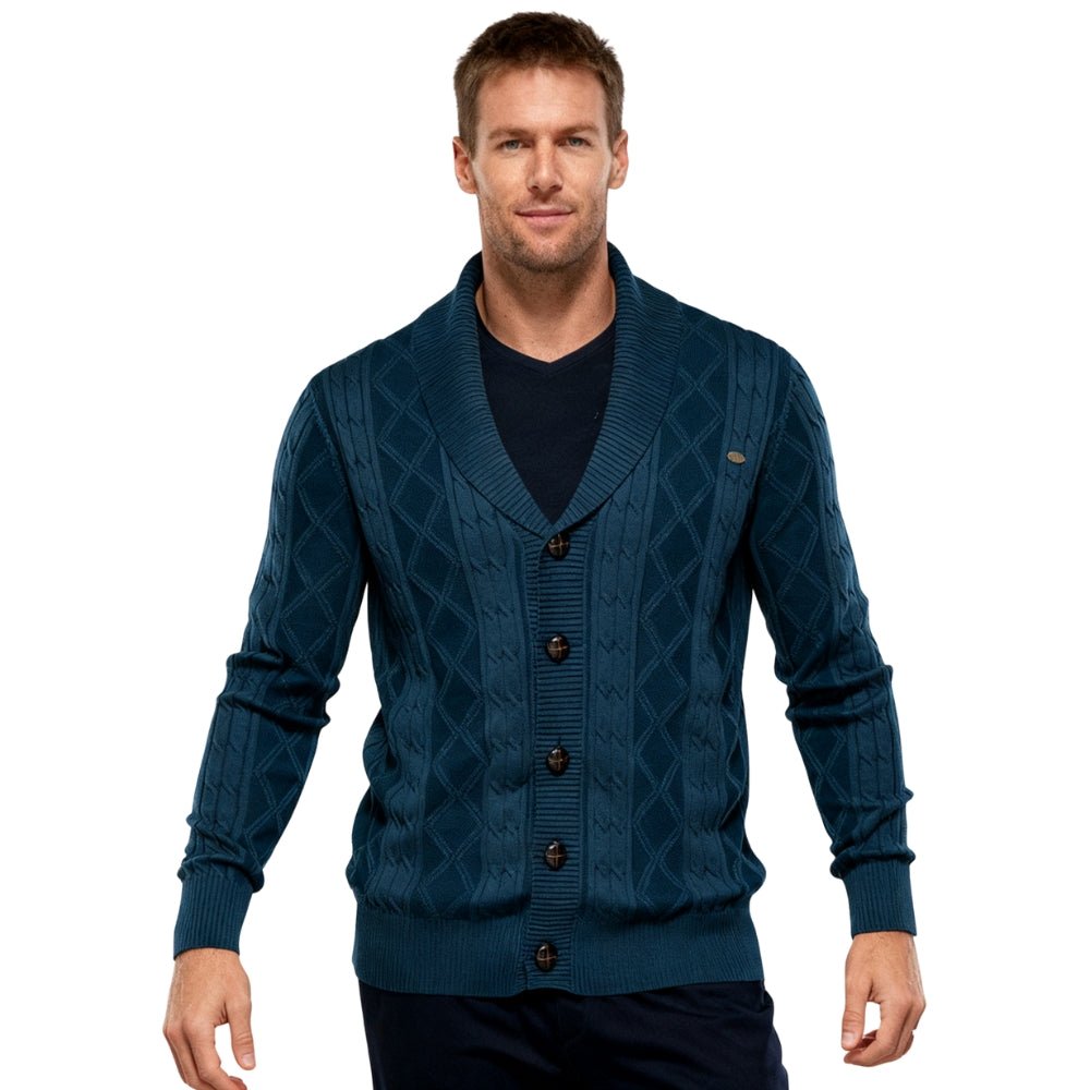 Man wearing a blue kouvr patterned cardigan on a white background