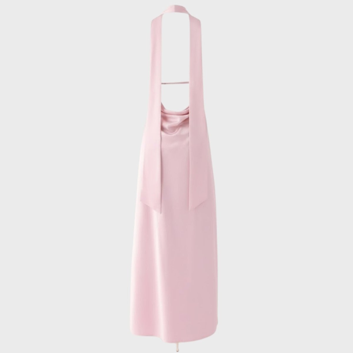 Flat product shot of the back of a pink backless evening gown, showing the halter ties and cowl detail.
