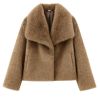 cruelty-free outerwear," "plush texture," "statement coat," "fall/winter essential," and "investment piece