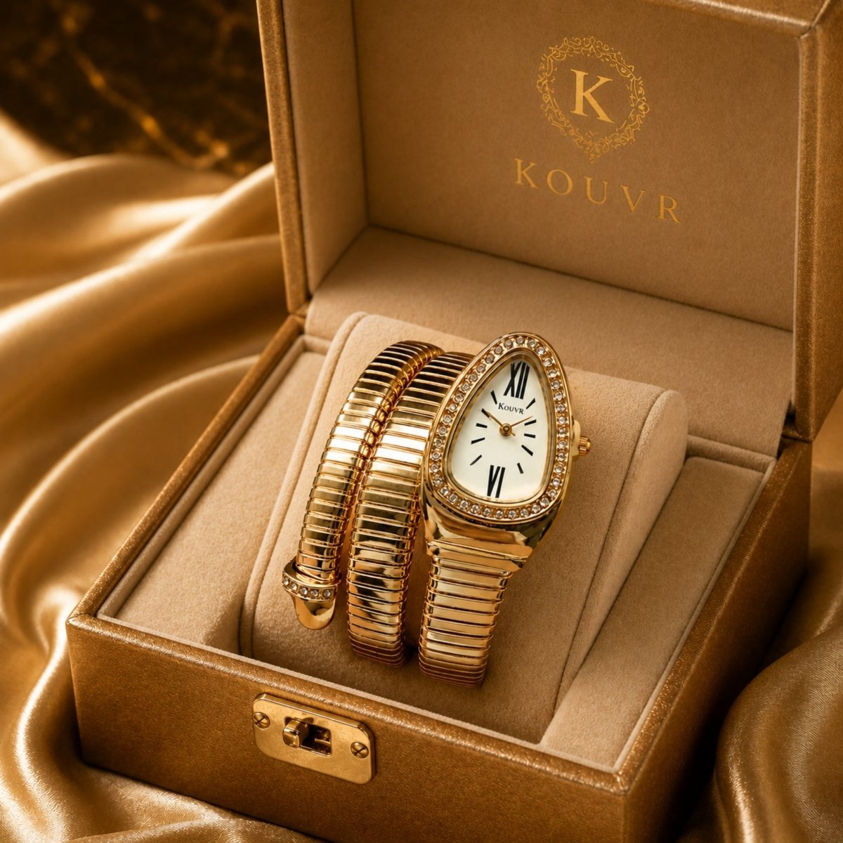 The Kouvr gold statement watch displayed beautifully on a plush cushion inside a custom beige and gold luxury presentation box.