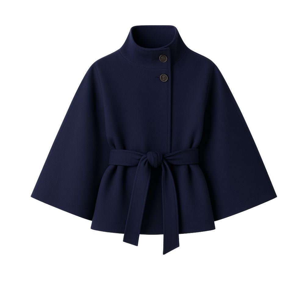 Model wearing Kouvr Fashion belted cape jacket with funnel neck and wide kimono sleeves