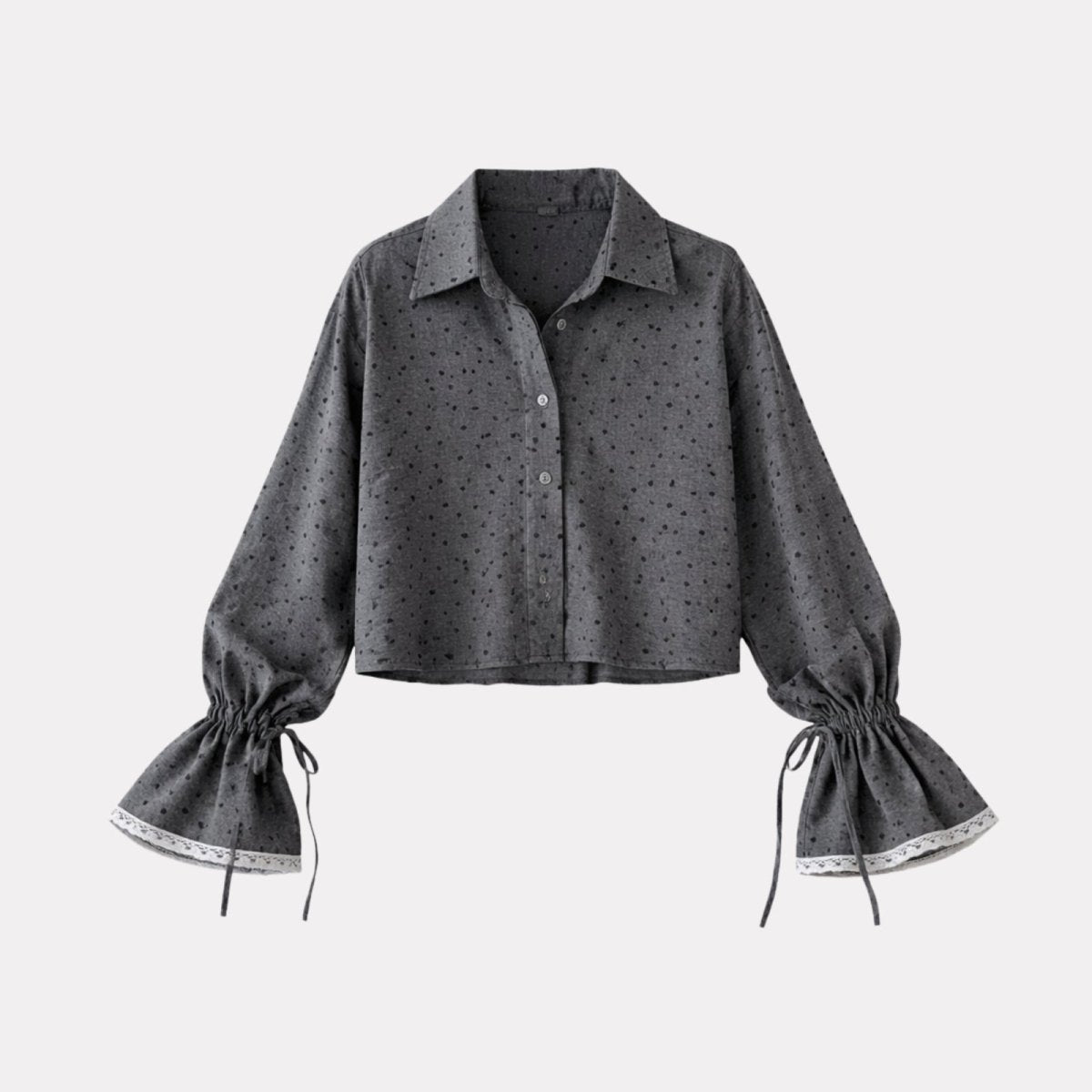 Product-only shot of the Kouvr Kara gray dotted balloon sleeve blouse, laid flat to show its full shape and details against a white background.