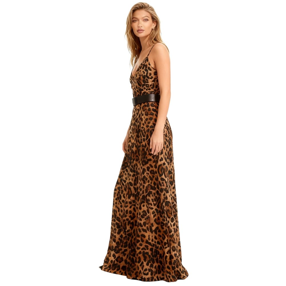 Woman wearing a leopard print Kouvr dress with a belt on a white background