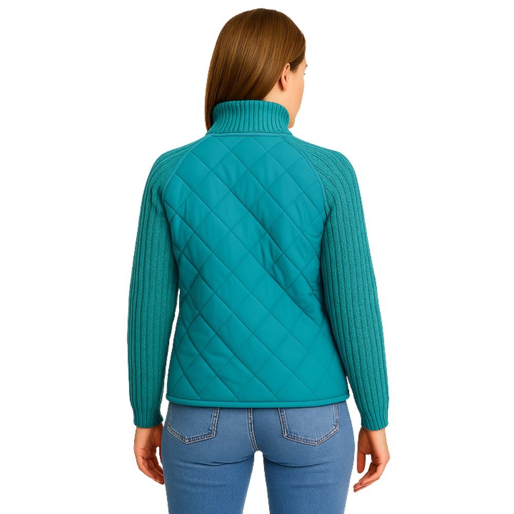 Back view of the Mika Hybrid Jacket in Teal showing quilted body and ribbed knit sleeves
