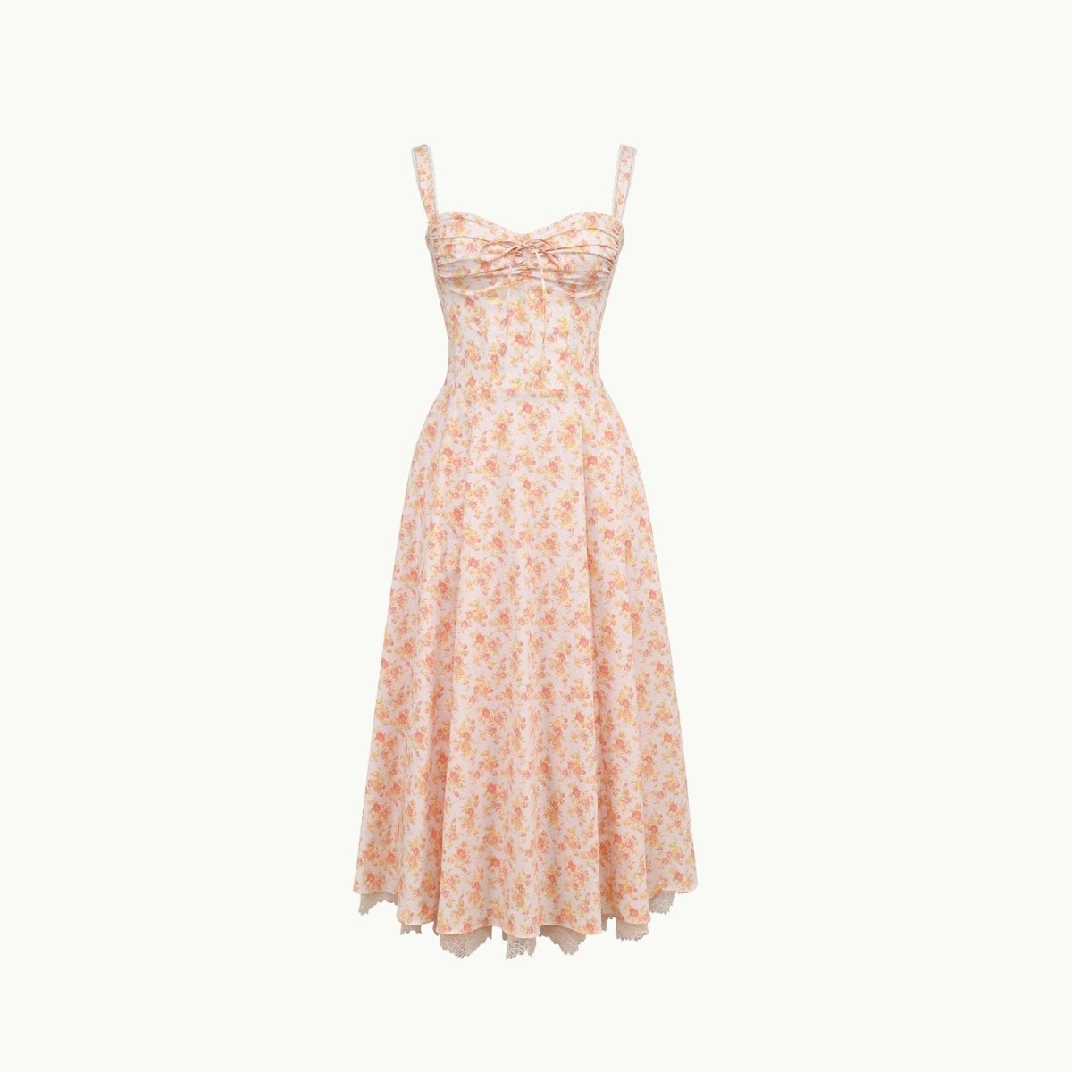 Close-up detail of the sweetheart neckline, tie-front feature, and jacquard fabric of the yellow rose floral midi dress.