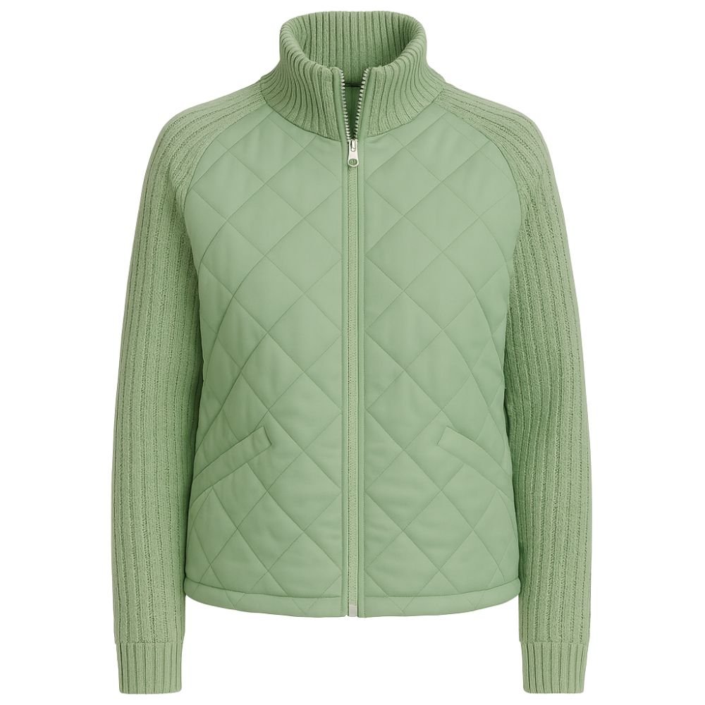 Model wearing Kouvr sage green quilted jacket with cable knit sleeves, viewed from the fron