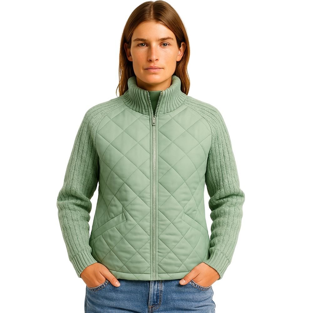 Model wearing the Kouvr Arlington Quilted Hybrid Jacket with blue jeans