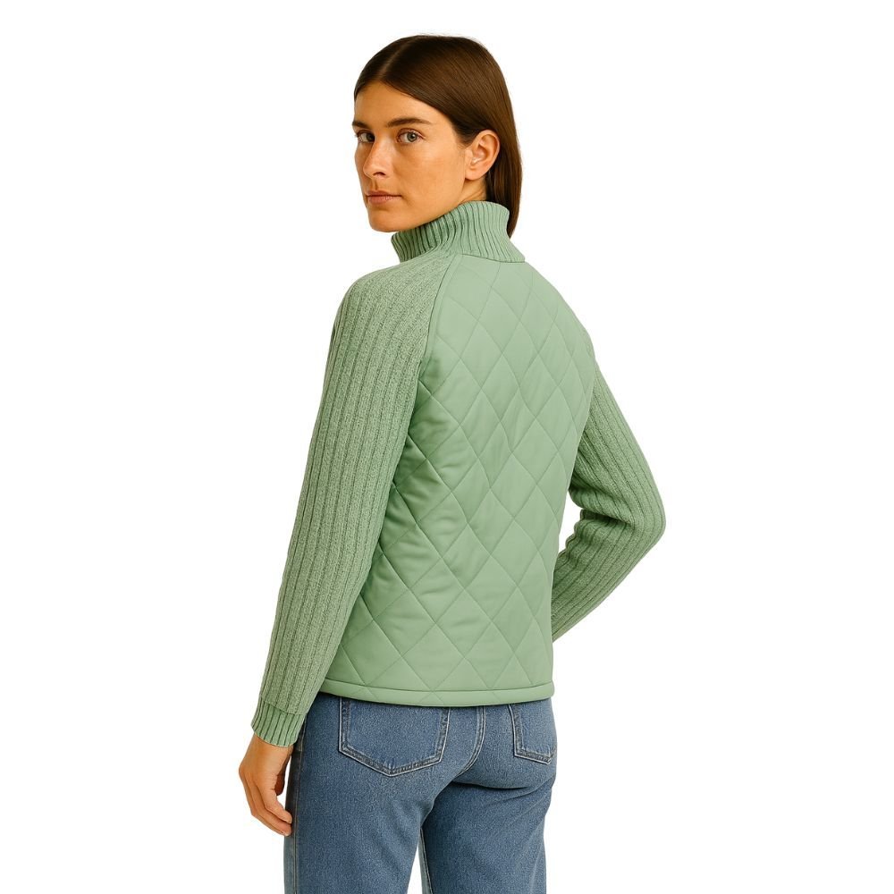 Model wearing the Kouvr Arlington Quilted Hybrid Jacket with blue jeans