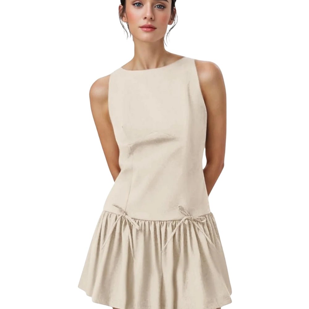 Woman wearing a ivory Kouvr sleeveless dress on a white background