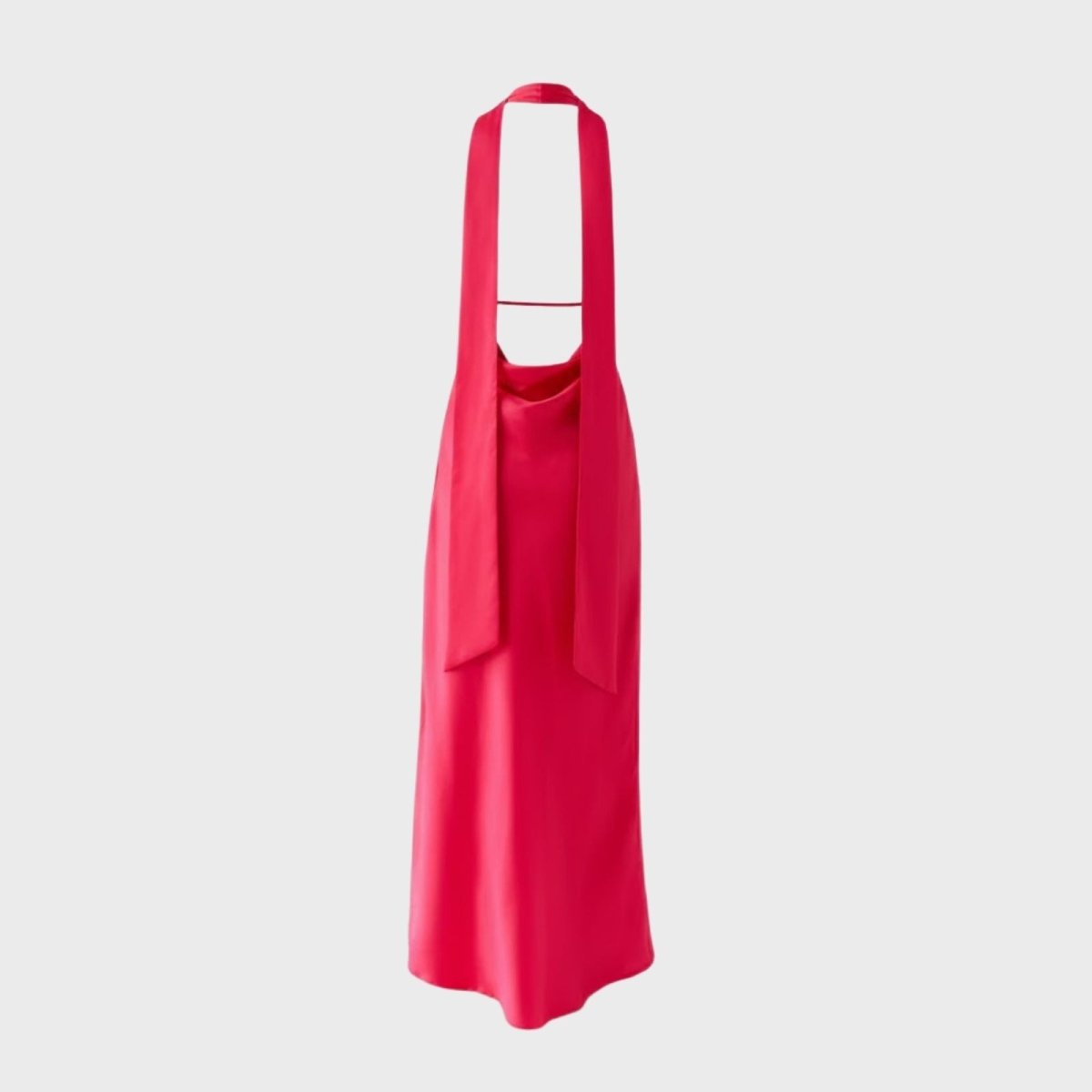 Flat lay back view of the Kouvr Sharon fuchsia red dress, displaying the long halter neck ties and open back construction.