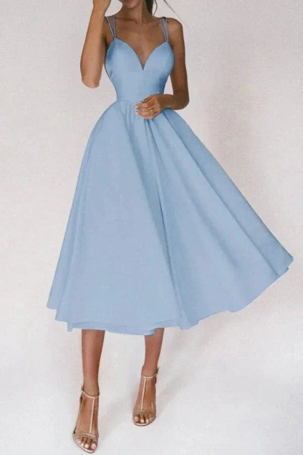 Weave semantically related terms throughout the description: "elegant silhouette," "flowing skirt," "sophisticated attire," "ceremony guest," "reception dress," and "special occasion