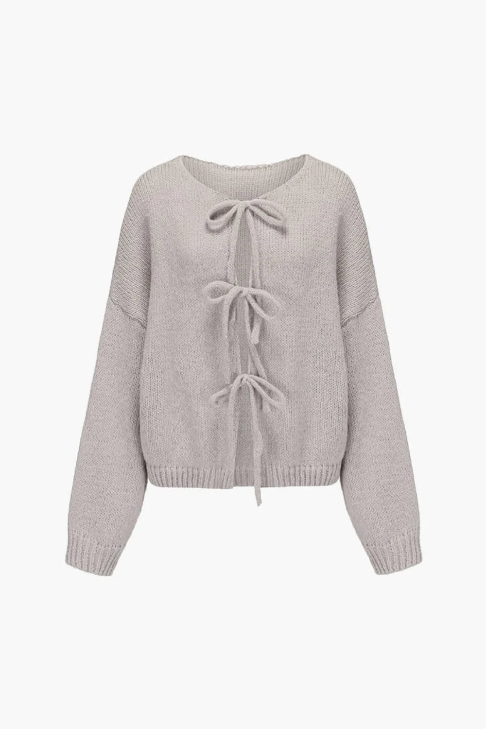 coquette aesthetic', 'slouchy fit', 'balloon sleeve', 'cropped sweater', 'luxury knitwear', 'soft layering piece', and 'transitional knit