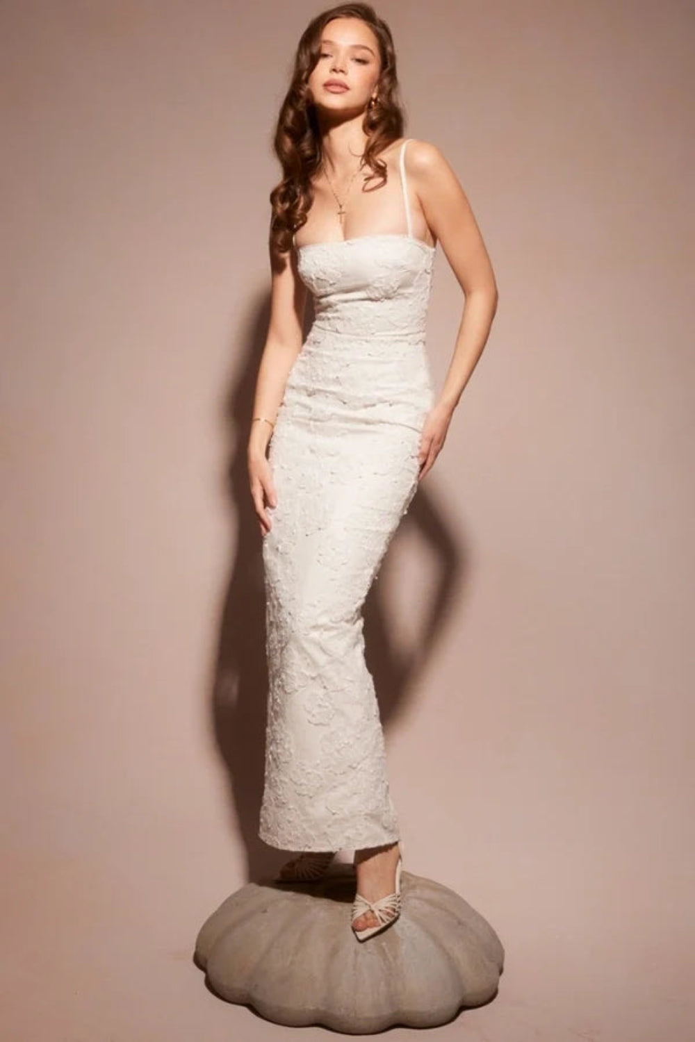 sculptural silhouette," "couture detailing," "ethereal elegance," "minimalist bride," "civil ceremony attire," and "rehearsal dinner outfit