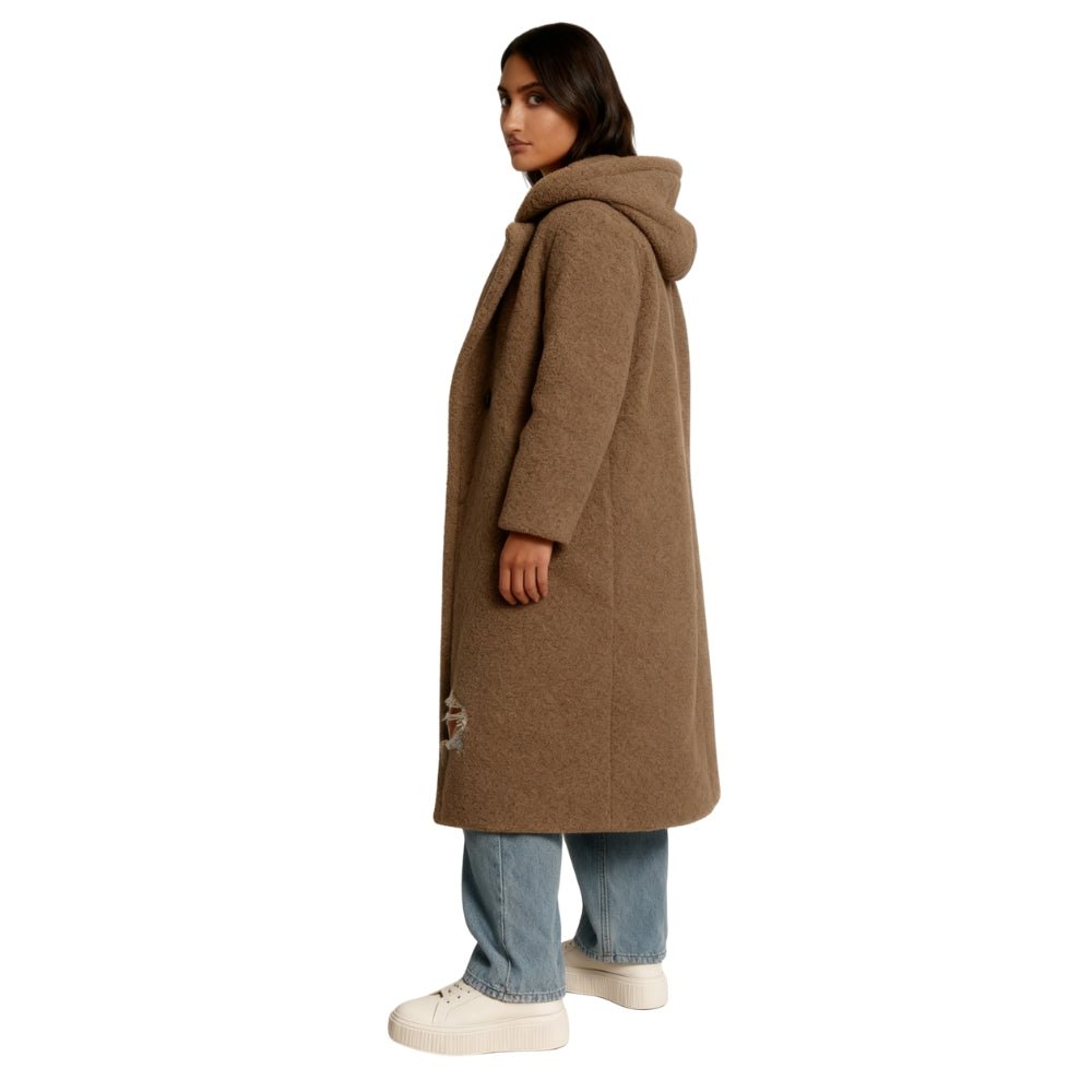 bouclé texture," "double-breasted tailoring," "investment outerwear," "fall essentials," and "longline silhouette