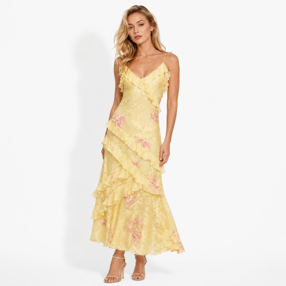 Woman wearing Kouvr yellow floral lace tiered ruffle maxi dress with v-neckline facing forward