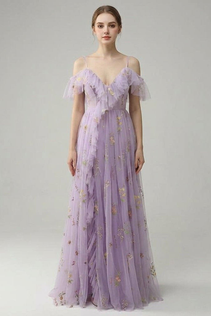 Front view of the Fenlo Form lavender floral embroidered tulle maxi dress featuring romantic off-the-shoulder ruffles and a flattering V-neckline.