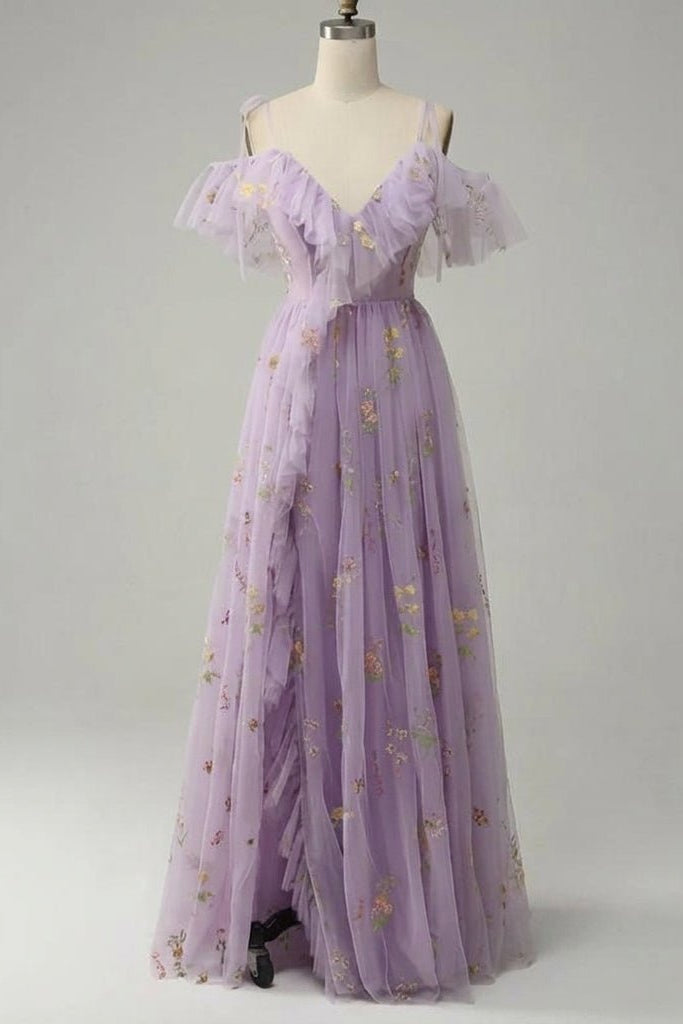 Full length mannequin display of the A-line lavender tulle wedding guest maxi dress showcasing the cascading front slit ruffles.