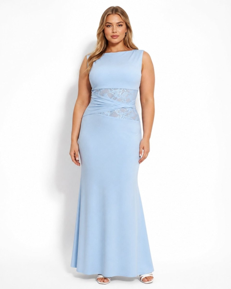 A woman modeling a sleeveless light blue maxi dress with a lace waist detail, standing against a plain white studio background.