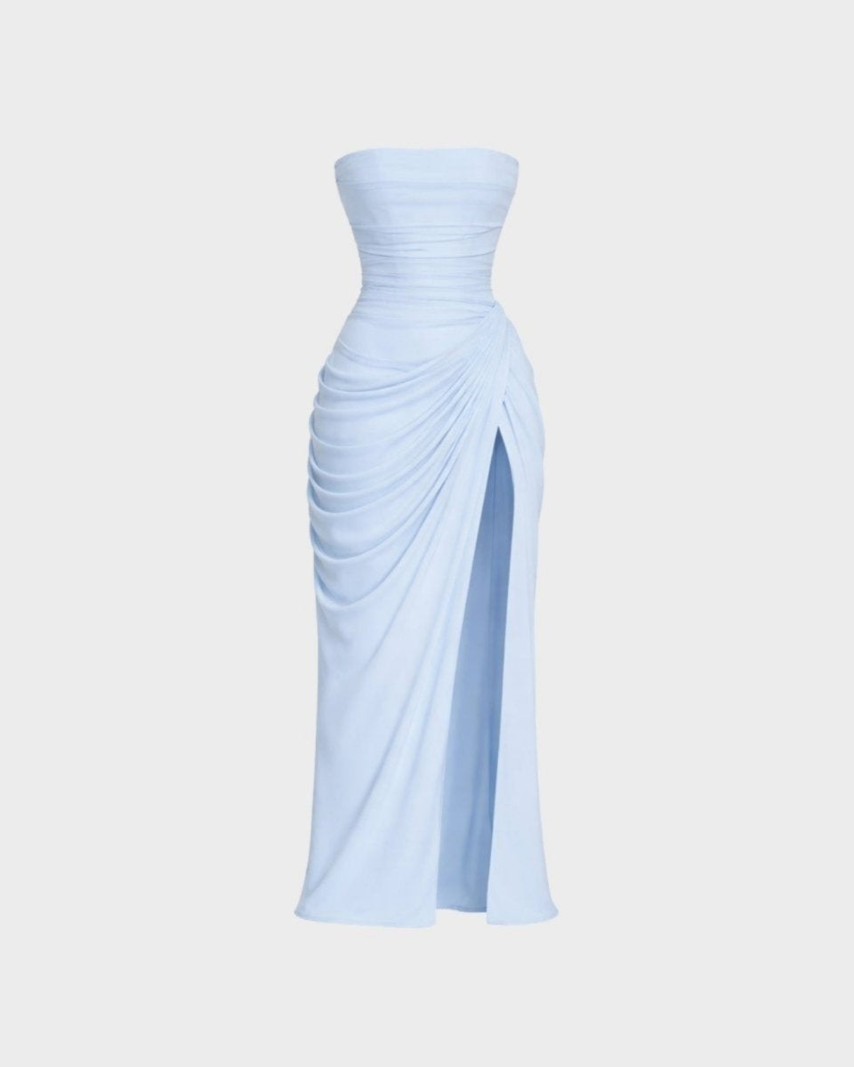 Front view of the light blue strapless ruched maxi dress with slit on a ghost mannequin showcasing the draping details.