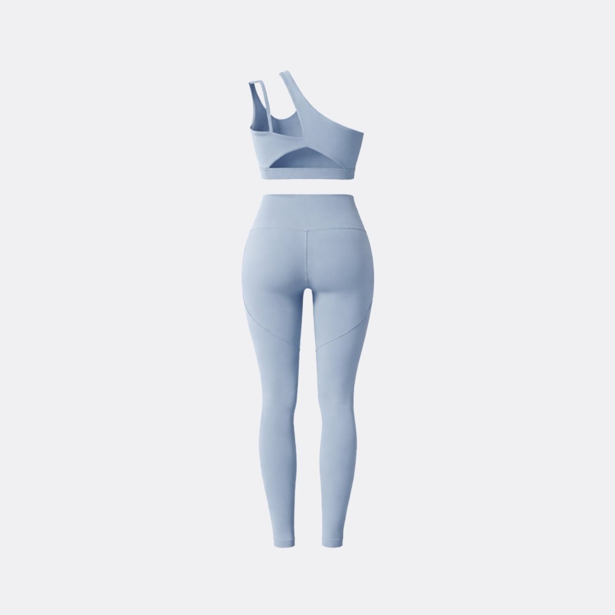 Back view of empty Kouvr light blue activewear set highlighting back cutout and contouring stitch details.