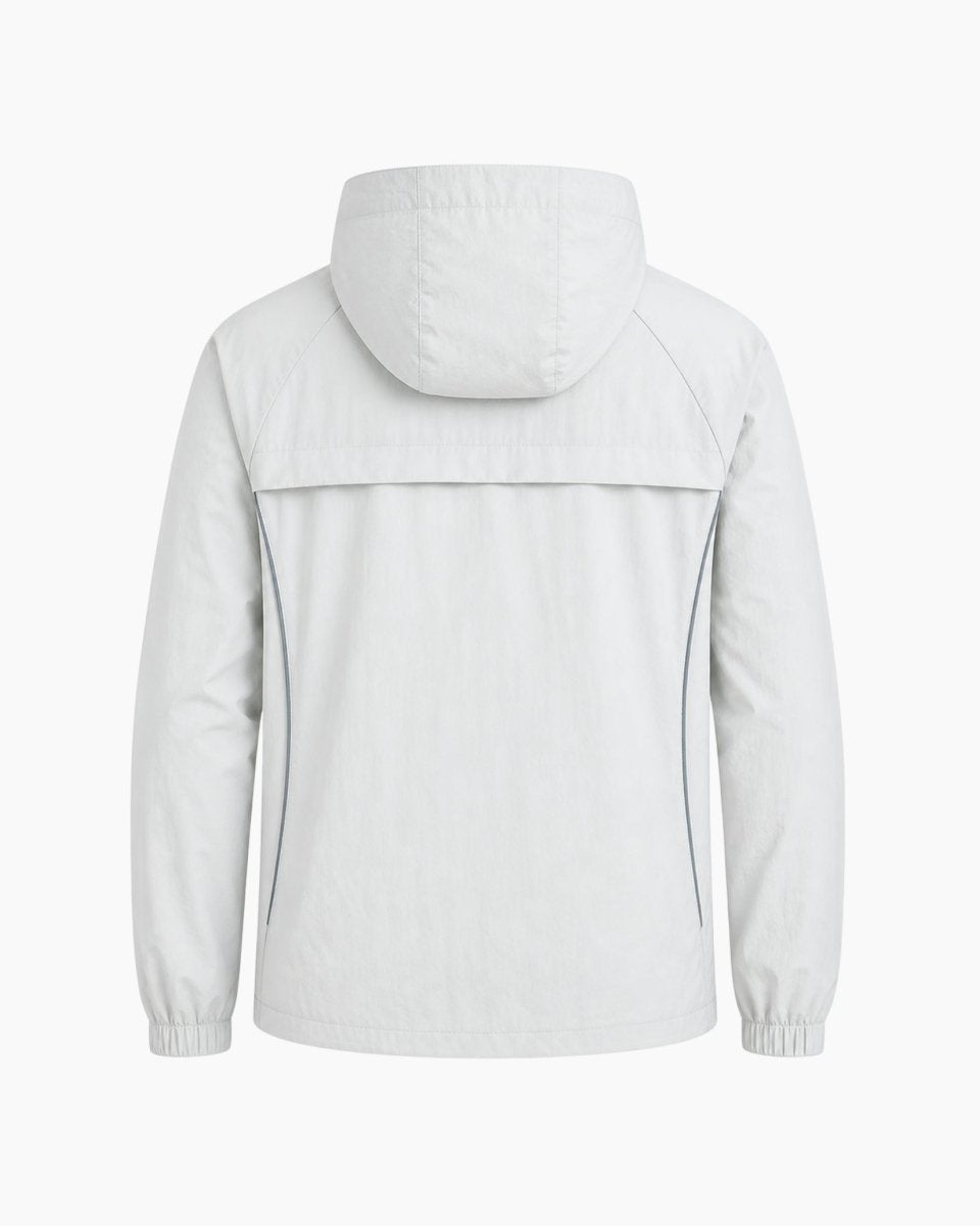 Flat lay back view of a light grey hooded rain jacket emphasizing the clean lines and back ventilation panel.