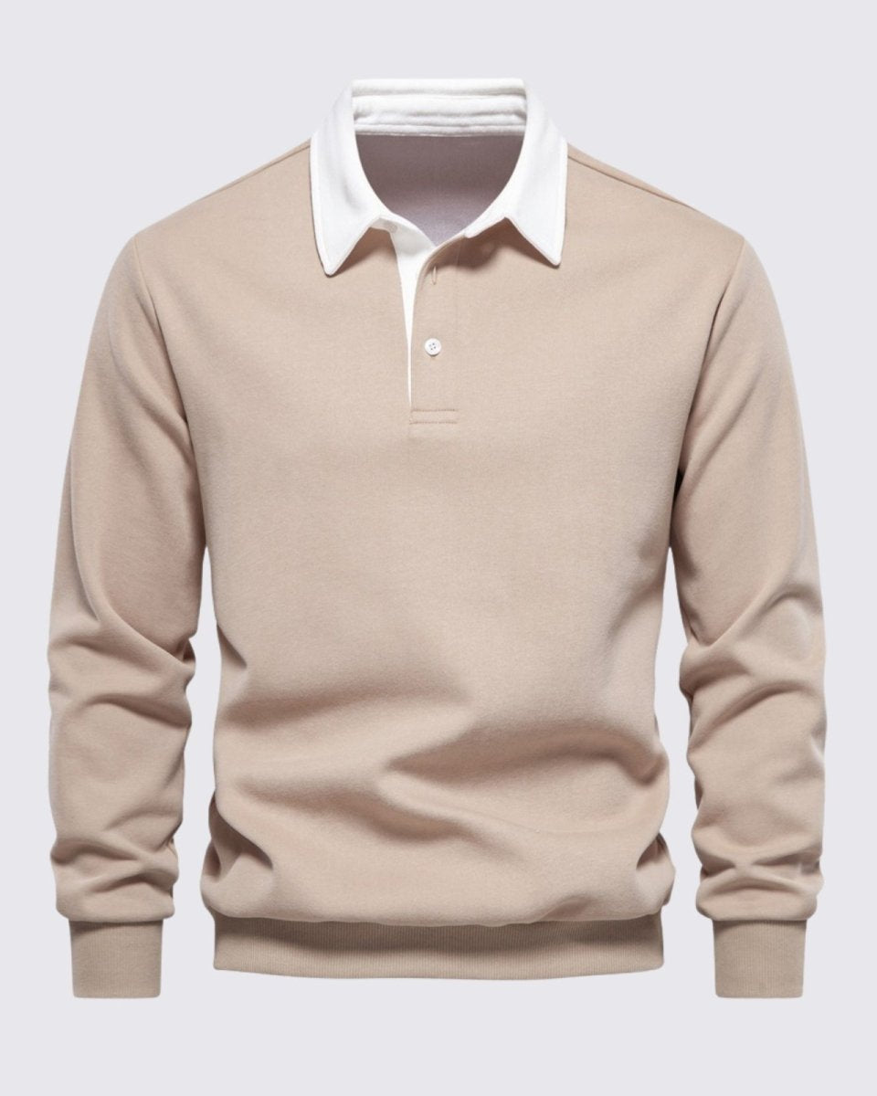 Flatlay product shot of the men's long sleeve polo in light beige, detailing the white collar, placket, and knit texture.