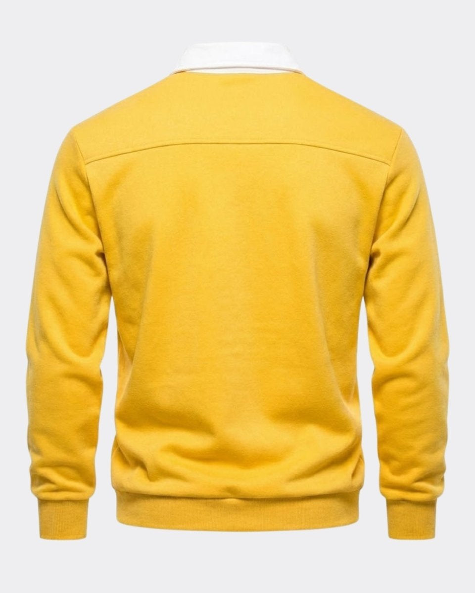 Back view flat lay of a men's yellow knit sweater showing the horizontal yoke seam detail and ribbed hem.